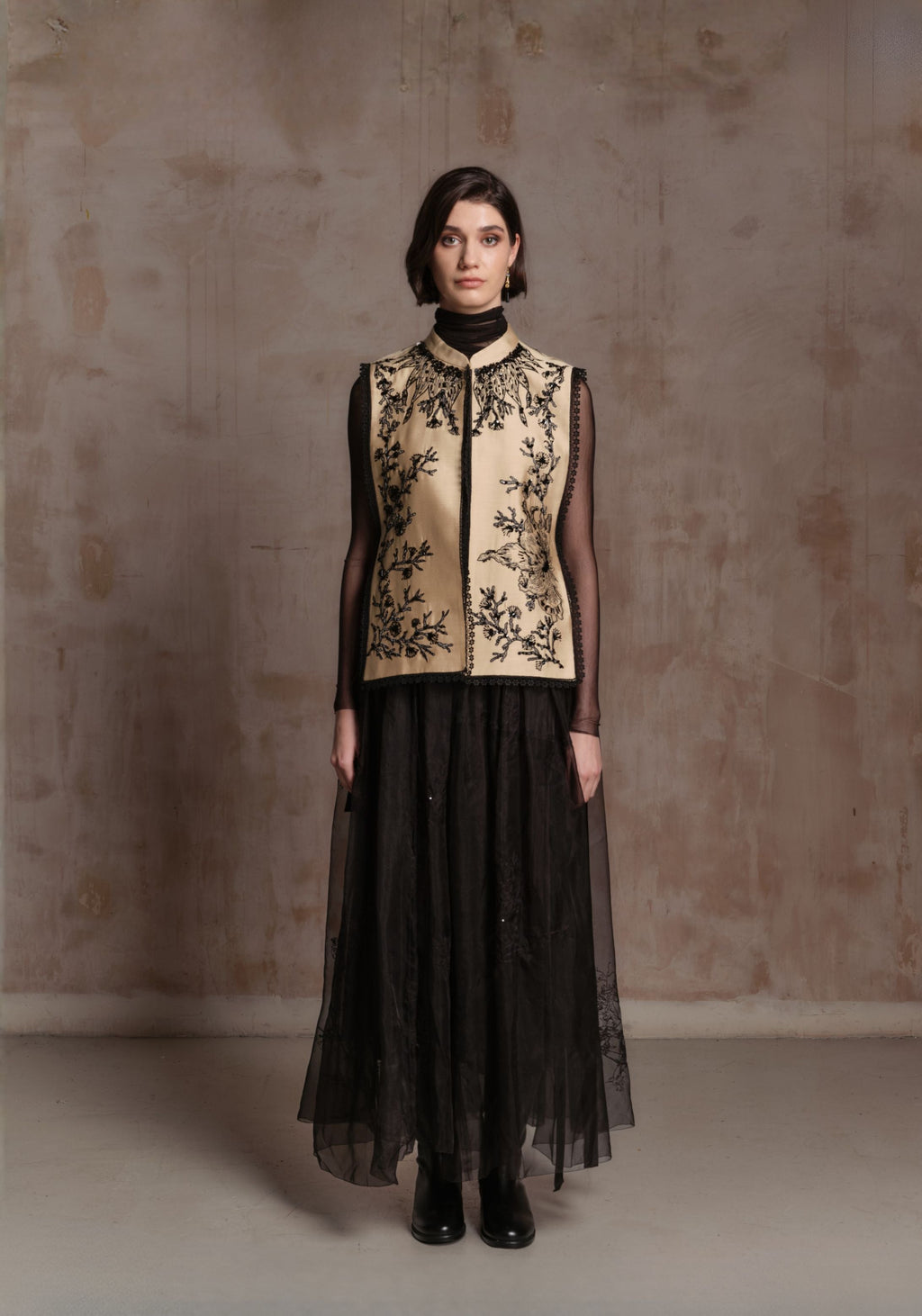 Beige Vest with Black Beadings and Ribbon on the Side