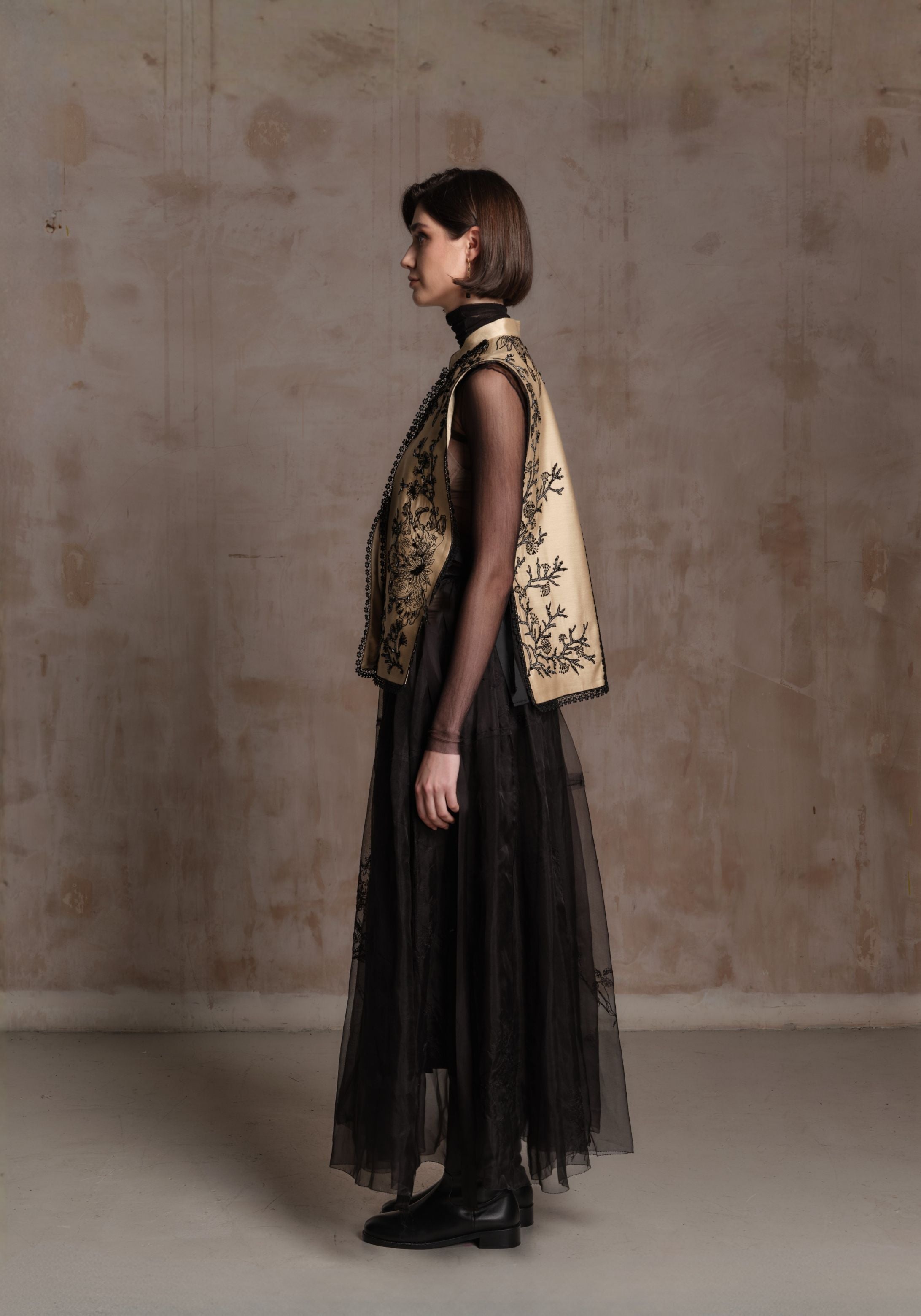 Beige Vest with Black Beadings and Ribbon on the Side