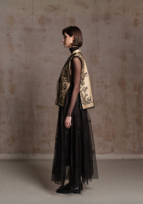 Beige Vest with Black Beadings and Ribbon on the Side