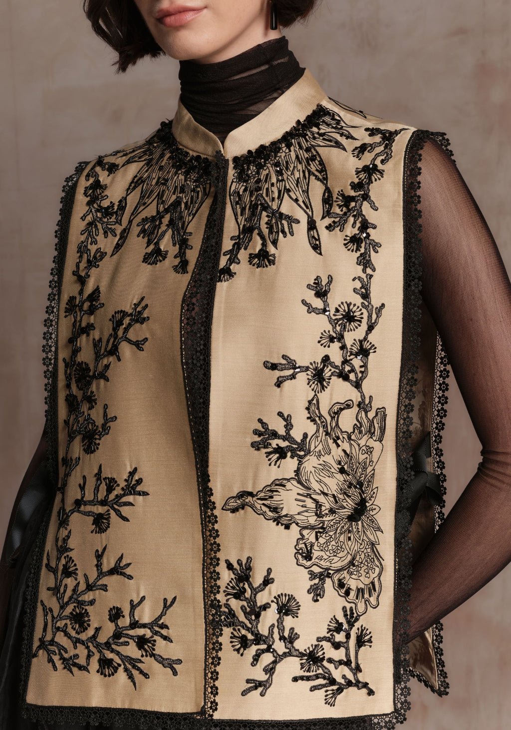 Beige Vest with Black Beadings and Ribbon on the Side